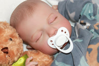 Thumbnail for A peaceful baby sleeps soundly, a pacifier gently resting in its mouth, embodying tranquility and innocence.