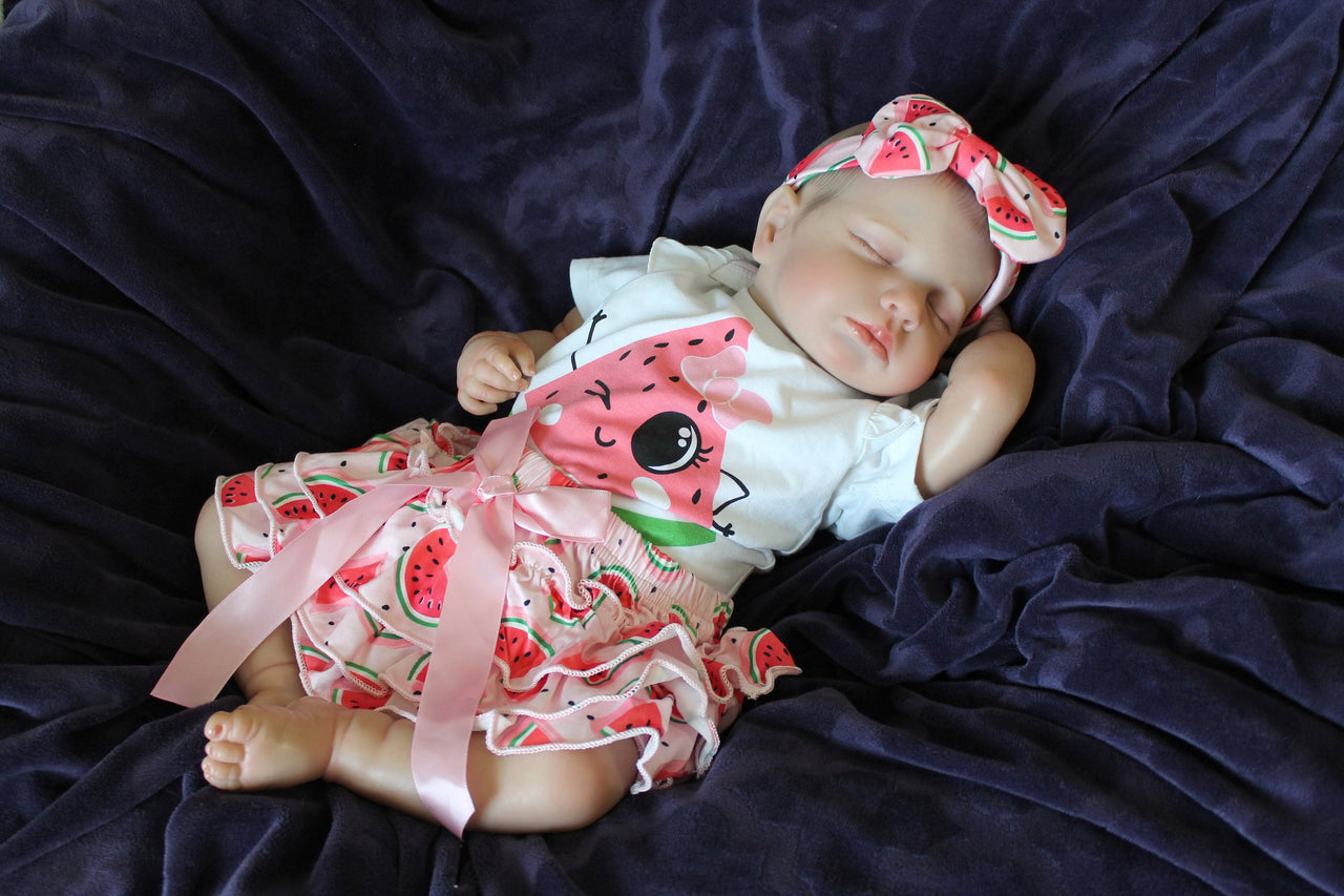 Reborn doll in watermelon outfit that says summer. Lifelike Reborn Baby Doll 20” 2 to 8 Pounds Weighted Newborn Baby Girl/Boy Soft Heavy Baby Dolls For Children Child Friendly Gifts For Girls