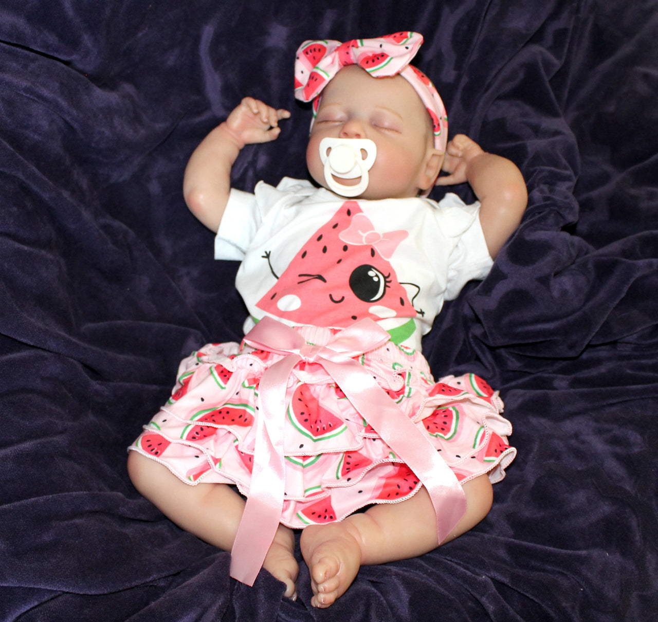 Reborn doll in watermelon outfit that says summer. Lifelike Reborn Baby Doll 20” 2 to 8 Pounds Weighted Newborn Baby Girl/Boy Soft Heavy Baby Dolls For Children Child Friendly Gifts For Girls