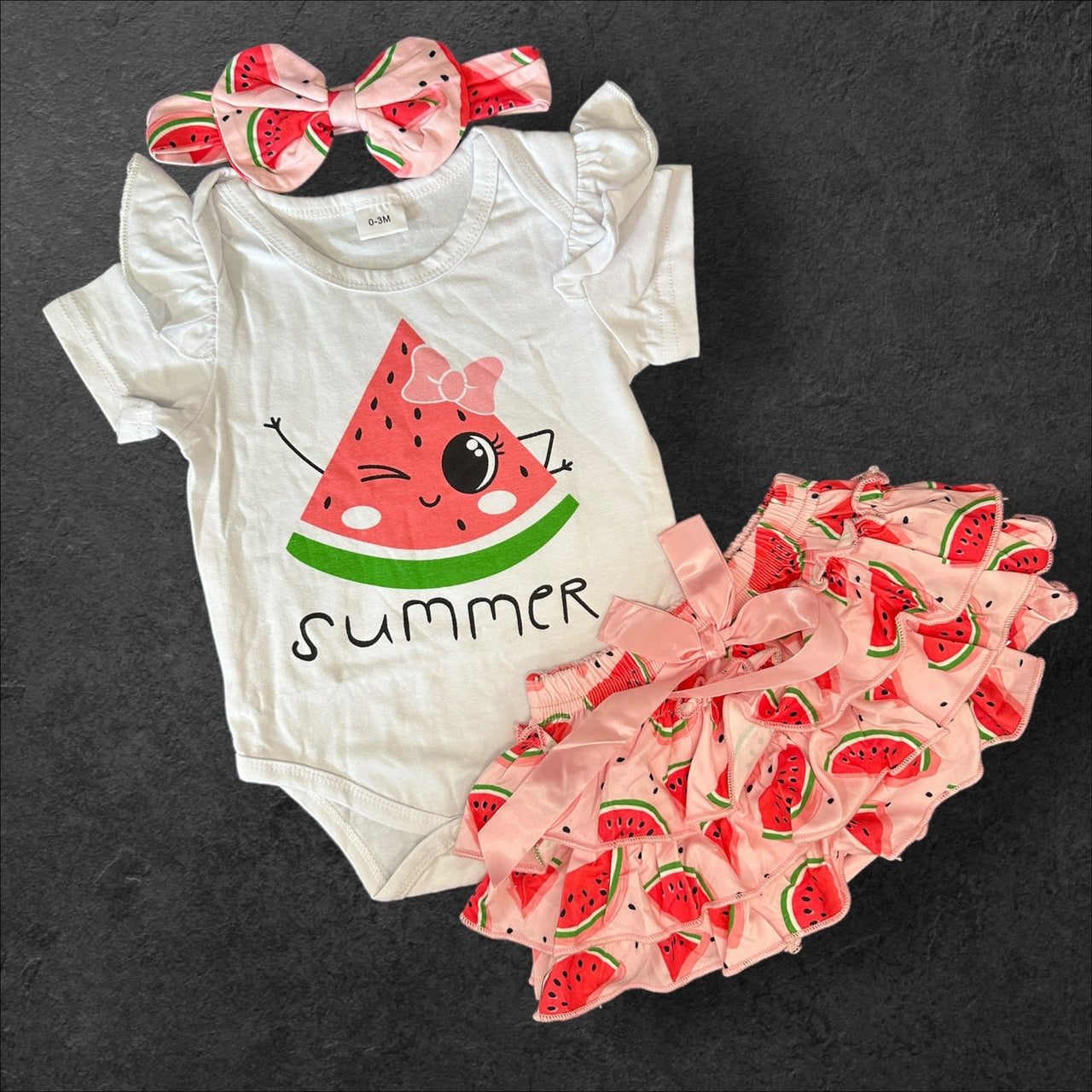 watermelon infant doll outfit with a watermelon skirt