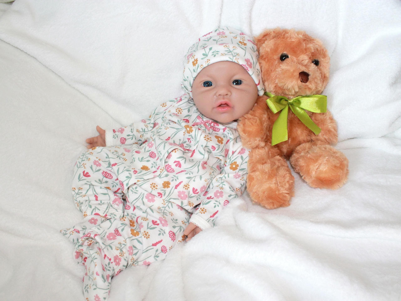 A baby doll with a pacifier placed on its head, showcasing a playful and whimsical design.