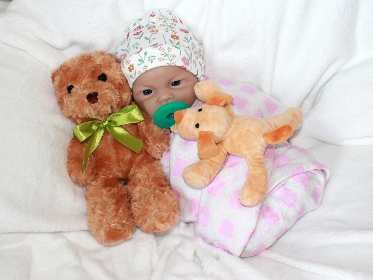 A baby doll with a pacifier placed on its head, showcasing a playful and whimsical design.