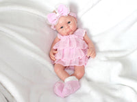 Thumbnail for Handmade reborn baby doll in pink frilly dress, realistic vinyl newborn with headband and socks, therapy or collectible lifelike doll
