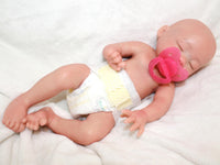 Thumbnail for Full silicone reborn baby doll 13 inches with closed eyes, bald head, and diaper, realistic preemie newborn doll on white blanket