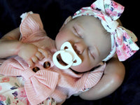 Thumbnail for Doll with rotating arms and a rotating head with a cloth body and vinyl limbs. The hair is painted on the head.