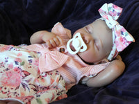 Thumbnail for Doll with rotating arms and a rotating head with a cloth body and vinyl limbs. The hair is painted on the head.